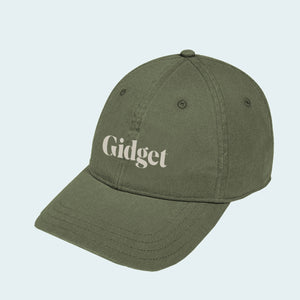 Women's wilderness green  colored dad-hat with print of g-fin logo