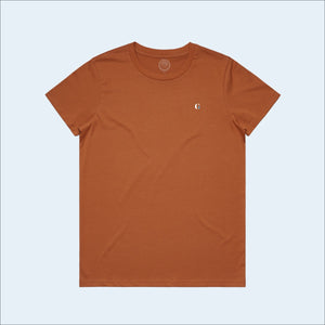 Women's copper colored t-shirt, view of front-side, with small g-fin accent logo
