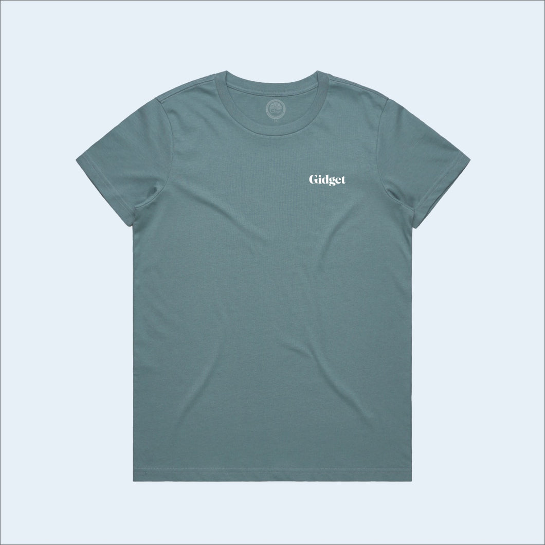 Women's slate-blue colored t-shirt, view of front-side, with small print of g-fin logo